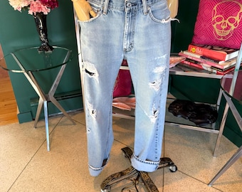W33 Jeans Levi's 505 rasgados unisex