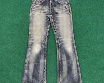 Big John blå utsvängda jeans i storlek 32