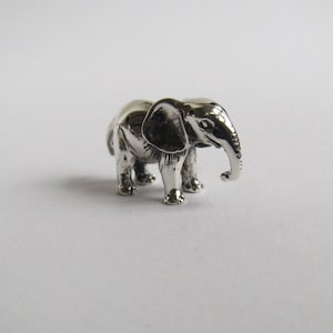 Tiny elephant figurine, silver