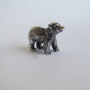 Tiny polar bear cub, silver