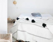 Solid color Moroccan pom pom blanket King Bed size.