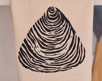 Black Shell Hand Made Tea Towel. Screen Printed using eco friendly waterbased ink on Ethically sourced 100% Cotton