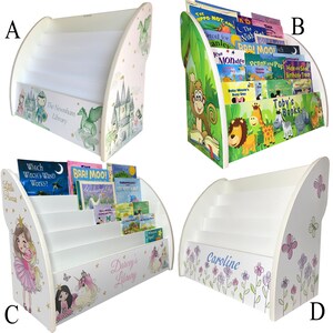 May include: Four different wooden bookends with various designs. The bookends are white with colorful illustrations. The designs include a castle and dragon, a jungle scene with animals, a fairy princess and unicorn, and a floral design with butterflies.