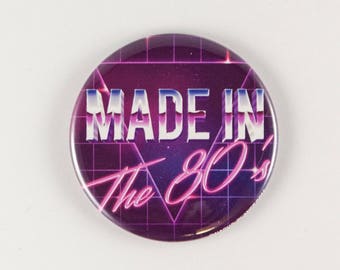 80's retro pin button or magnet, Made in the 80's, glowing 80's neon, 1980's style synthwave, retro vintage style magnet, retrowave outrun