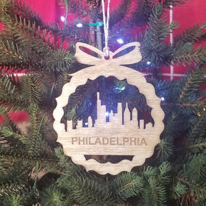 Philadelphia Skyline Ornament, Wooden Christmas ornament featuring Philly’s iconic skyline. New home gift or keepsake from Philadelphia, PA.
