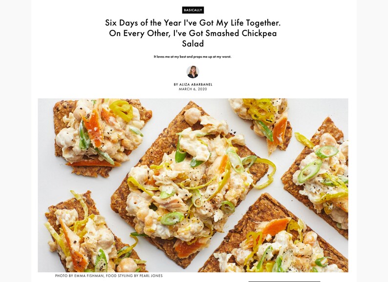 May include: A top-down view of five rectangular seeded crackers topped with a creamy smashed chickpea salad, garnished with sliced green onions and yellow pepper strips. The text reads: Basically, Six Days of the Year I've Got My Life Together. On Every Other, I've Got Smashed Chickpea Salad. It loves me at my best and props me up at my worst.