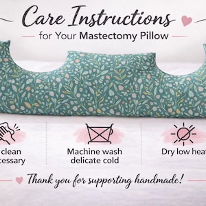 May include: A teal mastectomy pillow with a floral pattern. The pillow has a unique shape with curved sides and a central indentation. Care instructions are included: spot clean, machine wash cold, and dry low heat.
