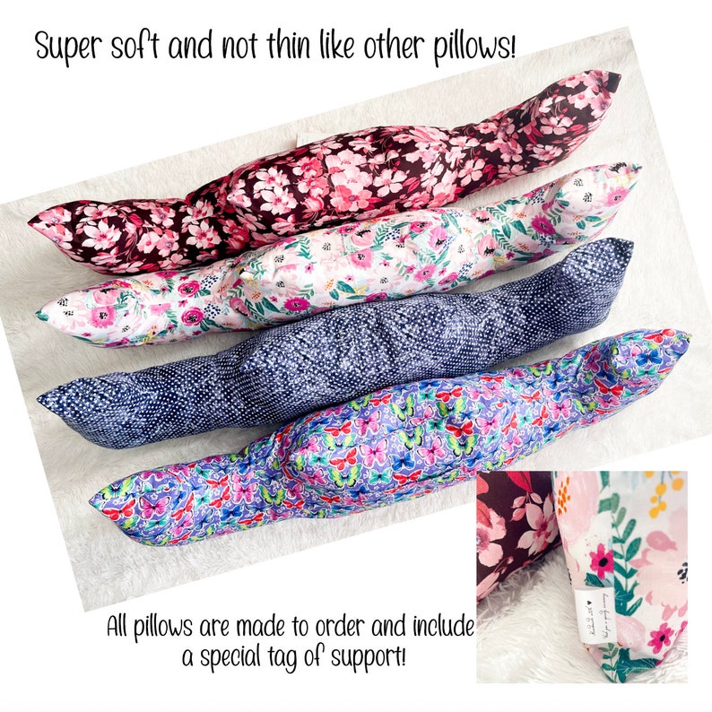 May include: Four long, bolster-style pillows with floral and patterned designs. The pillows are in shades of pink, white, blue, and purple. The text reads "Super soft and not thin like other pillows!" and "All pillows are made to order and include a special tag of support!"