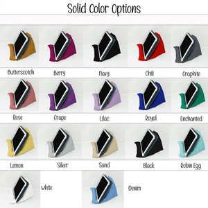 May include: A chart showing 14 different solid color options for a product. The colors are displayed as a tablet device resting on a pillow of the corresponding color. The colors are: Butterscotch, Berry, Navy, Chili, Graphite, Rose, Grape, Lilac, Royal, Enchanted, Lemon, Silver, Sand, Black, Robin Egg, White, and Denim.