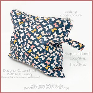 May include: A black cotton zippered pouch with a butterfly print. The pouch has a locking zipper closure and optional straps. The pouch is machine washable.