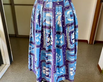 May include: A vintage midi skirt with a nautical theme. The skirt has a pleated design with a repeating pattern of sailboats, fish, and waves in shades of blue and purple. The skirt has a high waist and a button closure.