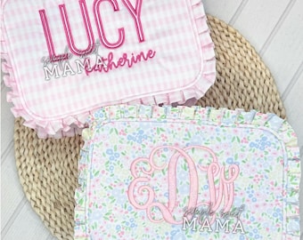 May include: Two embroidered fabric squares with pink and white gingham and floral patterns. The gingham square has the name "LUCY" and the text "Simple Sweet Mama Katherine" embroidered in pink. The floral square has a pink monogram "DW" and the text "Simple Sweet Mama" embroidered in pink.