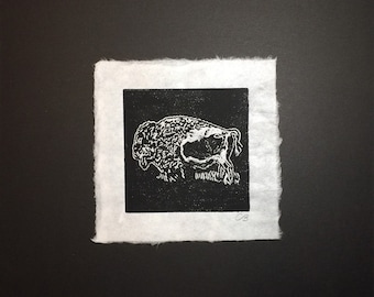 Colombo designed block print of a buffalo on handmade paper by Michael Colombo and Barbara Barkley