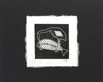 Mimbres block print of a ”Heron with a Big Fish” on handmade paper by Michael Colombo and Barbara Barkley