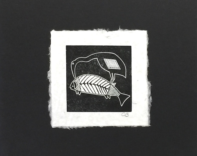 Mimbres block print of a ”Heron with a Big Fish” on handmade paper by Michael Colombo and Barbara Barkley