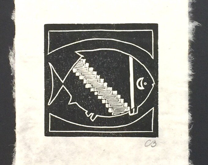Mimbres block print of a "Fish with a stairstep pattern" on handmade paper by Michael Colombo and Barbara Barkley