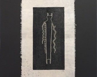 Block print of a pictograph on handmade paper by Michael Colombo and Barbara Barkley