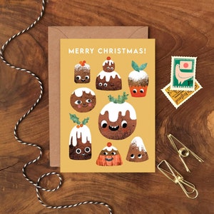 Tarjeta navideña con caras divertidas de budín de higos / Tarjeta de felicitación navideña ilustrada / Tarjeta con ilustración de comida navideña / Budín navideño divertido