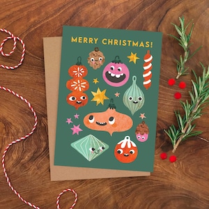 Carte de voeux avec une boule de Noël / Carte de voeux illustrée pour les fêtes / Carte d'illustration de décoration de Noël / Personnages drôles de boule de Noël