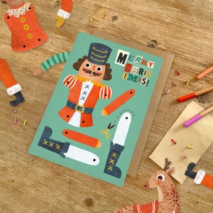 Biglietto d'auguri A5 con pupazzo con spilla da balia Schiaccianoci / Attività ritagliata per bambini, riempitivo per calze della Befana per le feste / Biglietto illustrato