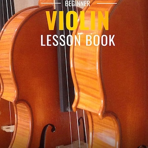 May include: Beginner Violin Lesson Book with 50 fun popular songs to play. The cover features three violins in a row, with the text "BEGINNER VIOLIN LESSON BOOK" in yellow letters and "50 FUN POPULAR SONGS TO PLAY" in white letters.