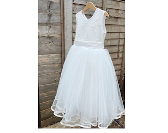 Hand made long length embroidered tutu dress with a large satin bow sash