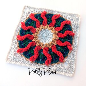 May include: A square, crocheted doily with a central circular design. The center is light blue, surrounded by a tan ring, and a dark blue and green pattern. Red, wavy crochet elements radiate outward. The doily is framed by a gray, openwork border. The text "Polly Plum" is in the lower right corner.