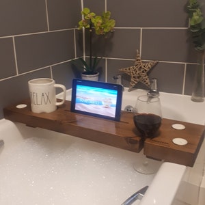 Wooden bath caddy featuring an iPad stand, perfect for relaxing baths. Available on Etsy UK.