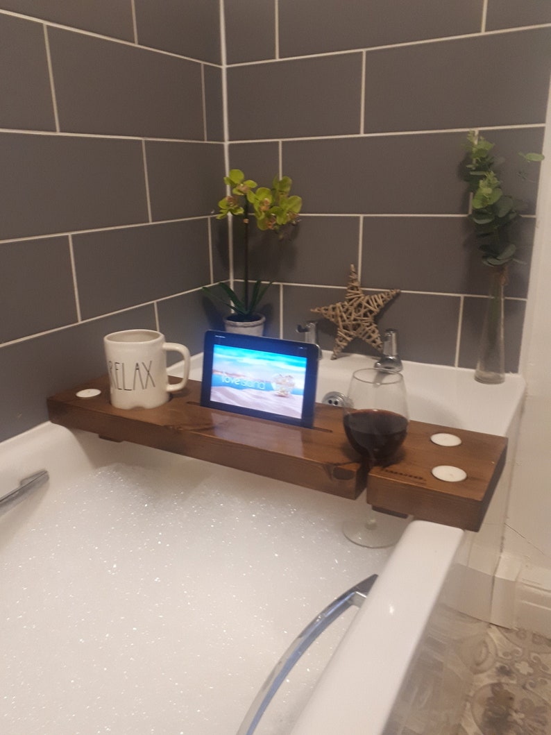 Wooden bath caddy featuring an iPad stand, perfect for relaxing baths. Available on Etsy UK.