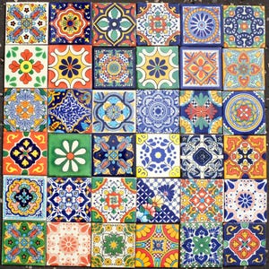 May include: A collection of thirty-six square ceramic tiles arranged in a six-by-six grid. Each tile features a unique, colourful geometric or floral pattern in shades of blue, yellow, red, green, and orange, creating a vibrant mosaic display.