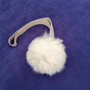 Sheepskin Ball Tug for small dogs and puppies.