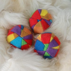 Soft balls filled with sheepskin ideal for puppy and small dog gifts