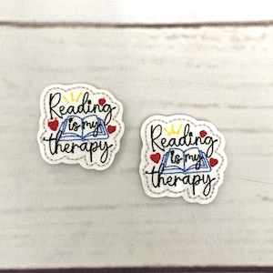 Libros de fieltro, terapias, bibliotecas, adornos con purpurina, lectura, apliques de fieltro, insignias, bordados.