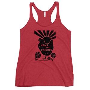 May include: Red tank top with a black silhouette of a chicken and the text "Hens are Friends" with a sunburst design behind the chicken. The text "Therapy Chickens" is at the bottom of the design.