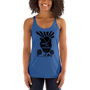May include: A royal blue tank top with a black graphic of a chicken with the text "Hens are Friends" and the words "Therapy Chickens" at the bottom.