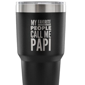 May include: Black stainless steel tumbler with a silver inscription that reads "My Favorite People Call Me Papi".