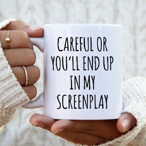 May include: White ceramic mug with black text that reads "Careful or you'll end up in my screenplay".