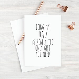 May include: A white card with black text that reads "Being my Dad is really the only gift you need".