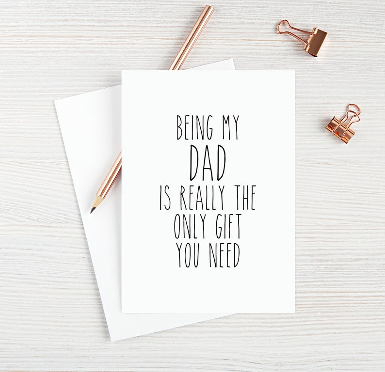 May include: A white card with black text that reads "Being my Dad is really the only gift you need".
