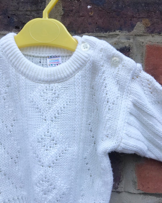 cream baby jumper