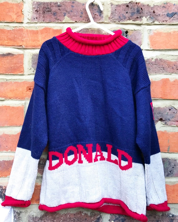 red donald duck sweater