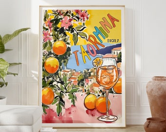 May include: A colorful illustration of Taormina, Sicily, with a glass of Aperol Spritz and oranges. The text "Taormina" is written in rainbow colors and the text "Sicily" is written in black.