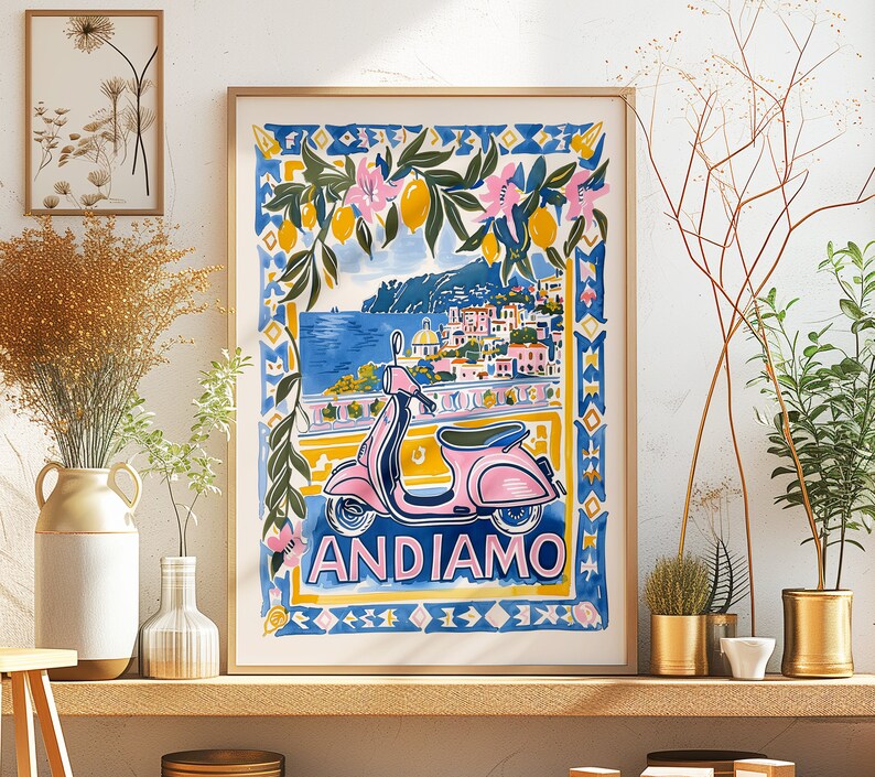 May include: A vintage-style illustration of a pink scooter with the words "Andiamo" printed below. The scooter is set against a backdrop of a colorful cityscape with a lush green tree and blue water in the background.