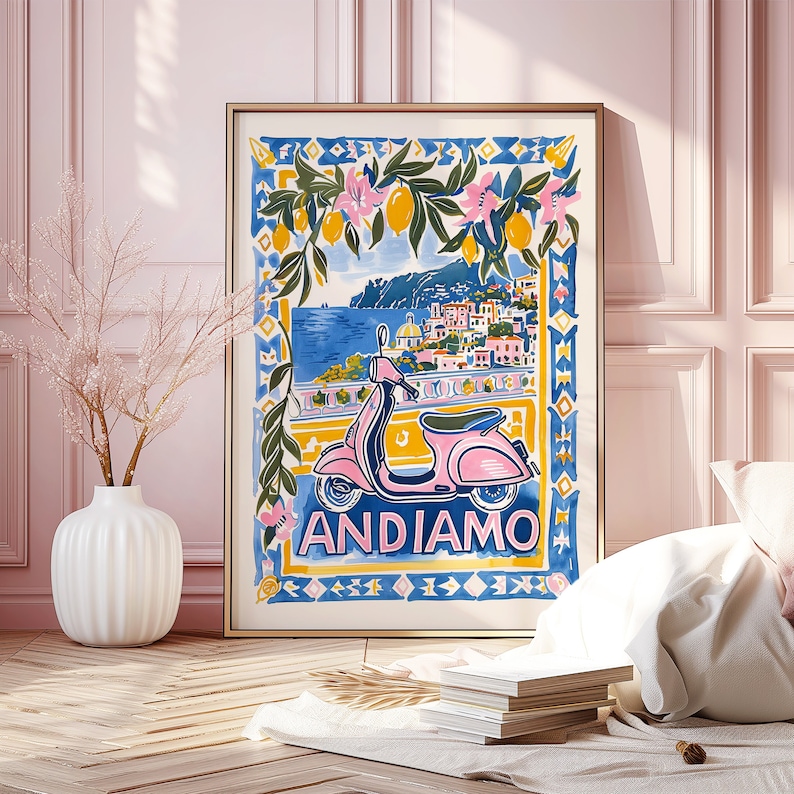 May include: A colorful illustration of a pink scooter with the word "ANDIAMO" printed on the front. The scooter is set against a backdrop of a blue ocean, a cityscape, and a lemon tree with yellow lemons.