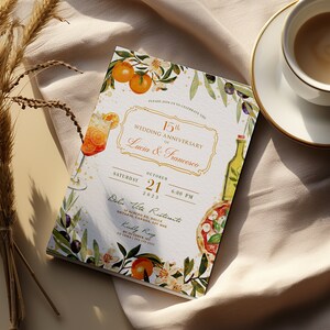 May include: A wedding anniversary invitation with a watercolor illustration of oranges, olives, a bottle of olive oil, a glass of Aperol Spritz, and a pizza. The invitation is for Lucia and Francesco's 15th wedding anniversary on October 21, 2023, at 6:00 PM at Dalew Vita Ristorante.
