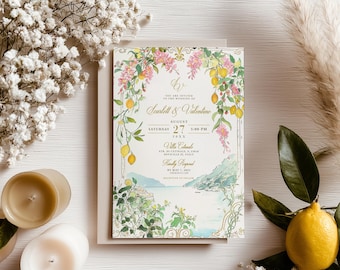 May include: A rectangular wedding invitation card featuring a watercolor illustration of lemons, pink flowers, and a coastal landscape. The text reads: You are invited to the wedding of Scarlett & Valentino, August Saturday 27 5:00 PM, Villa Cetinale.