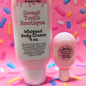 May include: A pink Sweet Tooth Boutique Whipped Body Cream tube and sample. The tube is labeled "4 oz." and lists ingredients. The sample has a round label that reads "Whipped Body Cream Sample."