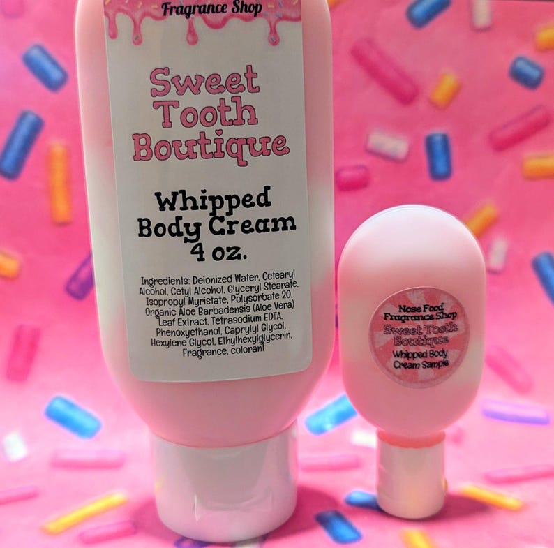 May include: A pink Sweet Tooth Boutique Whipped Body Cream tube and sample. The tube is labeled "4 oz." and lists ingredients. The sample has a round label that reads "Whipped Body Cream Sample."