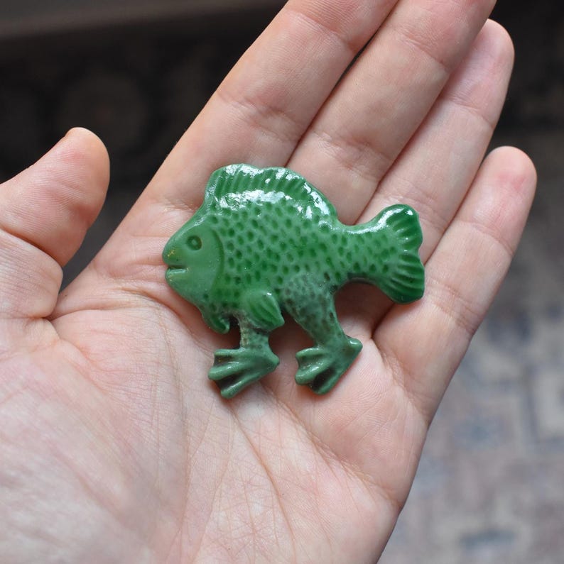 Green Medieval Walking Fish with Legs Fridge Magnet, handmade by Folkloria Design