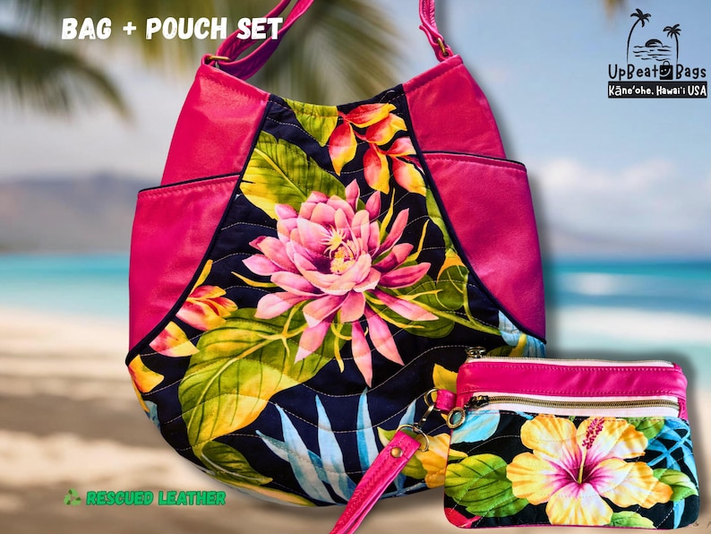 May include: A pink and floral handbag and pouch set. The handbag features a large pink flower design on a black background, with pink accents. The pouch has a matching floral pattern. The set is made with rescued leather.